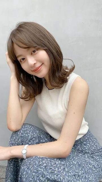 沖田愛加のニット姿①